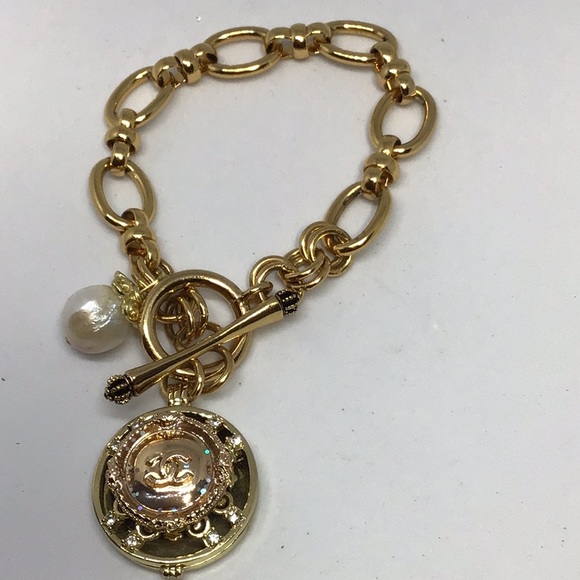 CHANEL Jewelry - Gold/baroque pearl Authentic coco button charm.